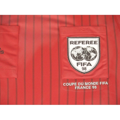 468 - A RED AND BLACK 1998 FRANCE WORLD CUP REFEREE SHIRT