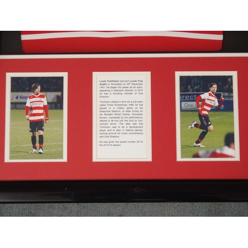 473 - A RED AND WHITE REPLICA DONCASTER ROVERS SHIRT