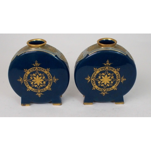 509 - A PAIR OF MINTON PATE SUR PATE MOON FLASKS