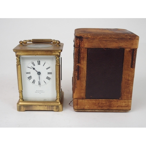 516 - A FRENCH BRASS AND GLASS CARRIAGE CLOCK