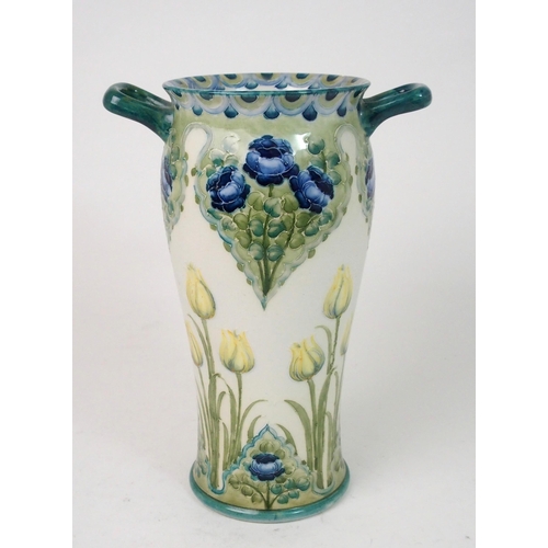 517 - A WILLIAM MOORCROFT FOR JAMES MACINTYRE 'TULIPS AND ROSE' PATTERN VASE