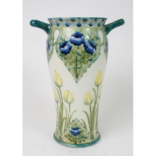 517 - A WILLIAM MOORCROFT FOR JAMES MACINTYRE 'TULIPS AND ROSE' PATTERN VASE