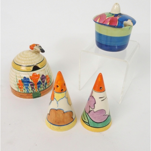 523 - A COLLECTION OF CLARICE CLIFF CERAMICS