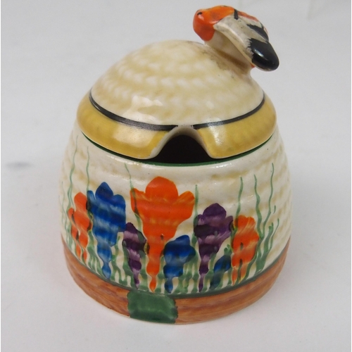 523 - A COLLECTION OF CLARICE CLIFF CERAMICS