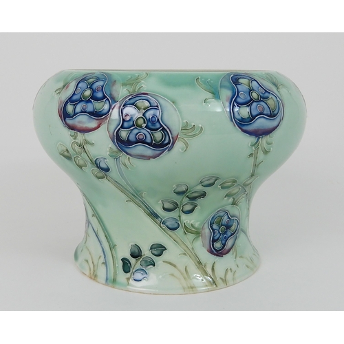 548 - WILLIAM MOORCROFT (BRITISH  1872-1945): A TUDOR ROSE PATTERN VASE