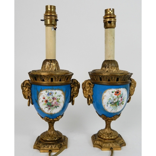 553 - A PAIR OF SEVRES STYLE URN LAMPS