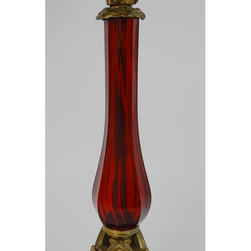 557 - AN ANTIQUE CANDELABRA TABLE LAMP