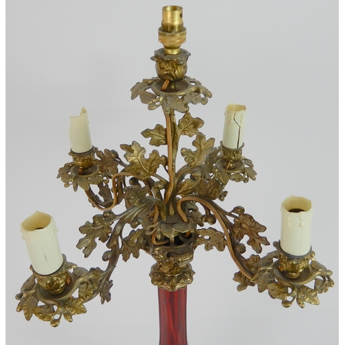 557 - AN ANTIQUE CANDELABRA TABLE LAMP