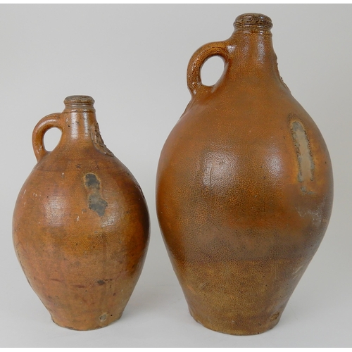 562 - A LATE 18TH/EARLY 19TH CENTURY STONEWARE BELLARMINE JUG