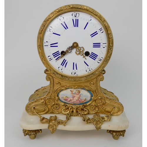 571 - A FRENCH STYLE MANTLE CLOCK