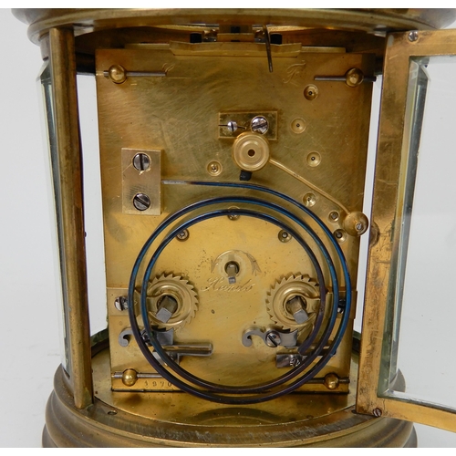 572 - A 19TH CENTURY LARGE OVAL BRASS REPEATING CARRIAGE CLOCK