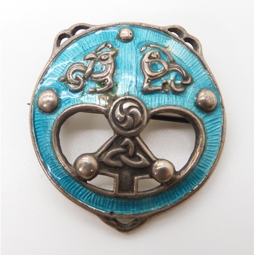 624 - A SILVER AND ENAMEL ALEXANDER RITCHIE BROOCH