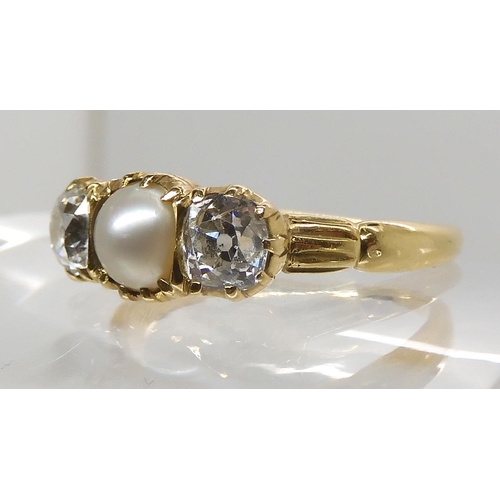 626 - AN 18CT GOLD DIAMOND AND PEARL RING