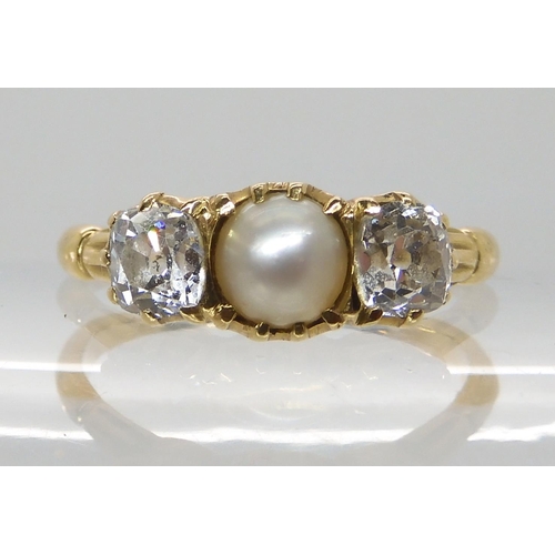 626 - AN 18CT GOLD DIAMOND AND PEARL RING