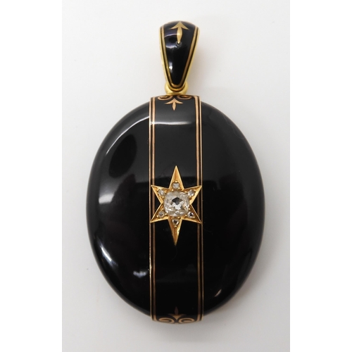 635 - A DIAMOND SET MOURNING PENDANT LOCKET