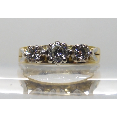 639 - A RETRO THREE STONE DIAMOND RING