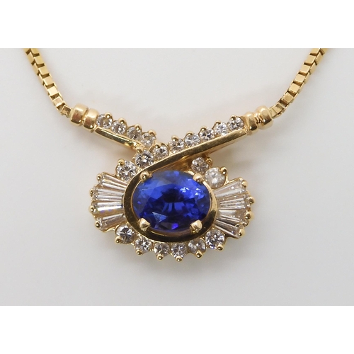 642 - A 14K GOLD TANZANITE AND DIAMOND NECKLET