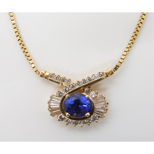 642 - A 14K GOLD TANZANITE AND DIAMOND NECKLET