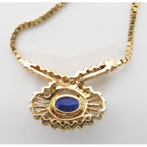 642 - A 14K GOLD TANZANITE AND DIAMOND NECKLET