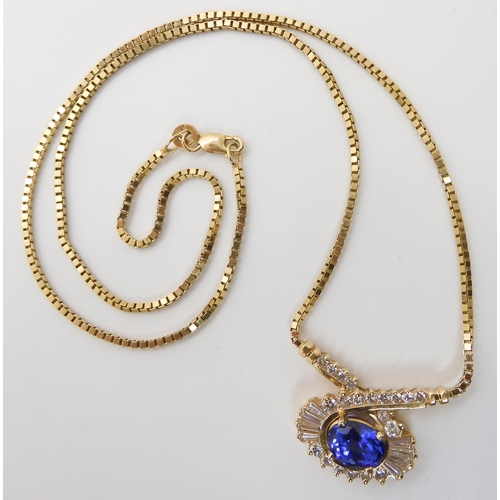 642 - A 14K GOLD TANZANITE AND DIAMOND NECKLET