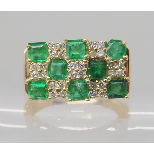 642A - A 14K EMERALD AND DIAMOND RETRO DRESS RING