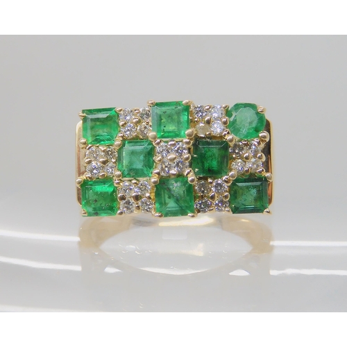 642A - A 14K EMERALD AND DIAMOND RETRO DRESS RING