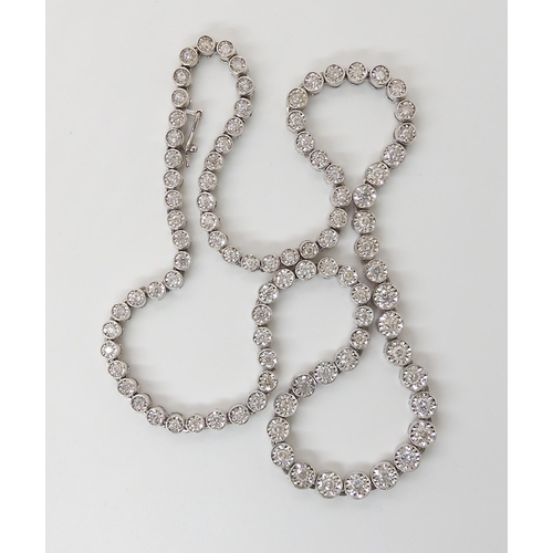 645 - AN 18K WHITE GOLD DIAMOND RIVERA NECKLACE