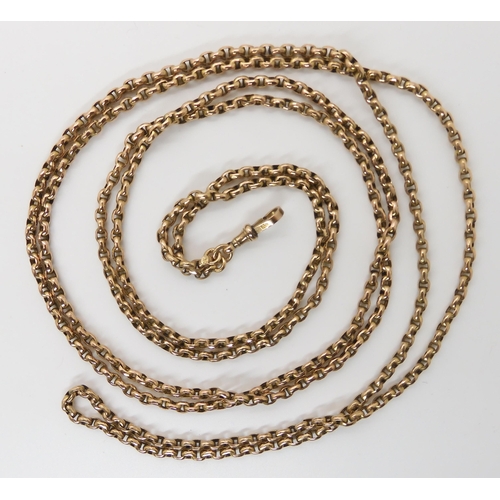 657 - A 9CT GOLD LONG GUARD CHAIN