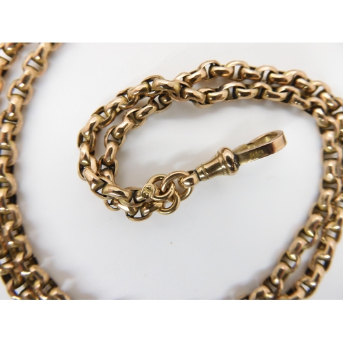 657 - A 9CT GOLD LONG GUARD CHAIN