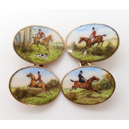 663 - A PAIR OF 9CT GOLD HUNTING SCENE CUFFLINKS