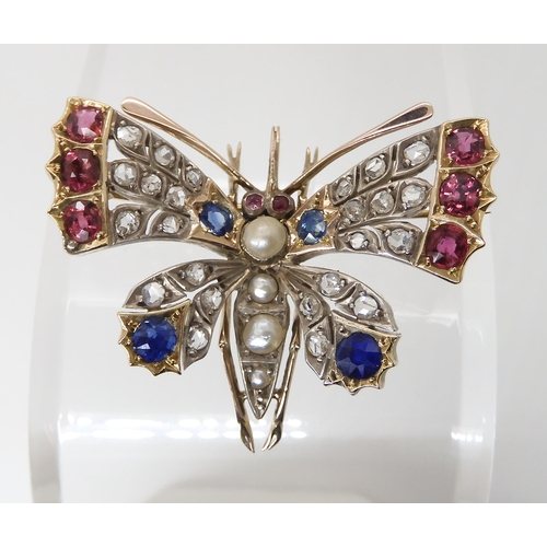 664 - A VINTAGE GEM SET BUTTERFLY BROOCH