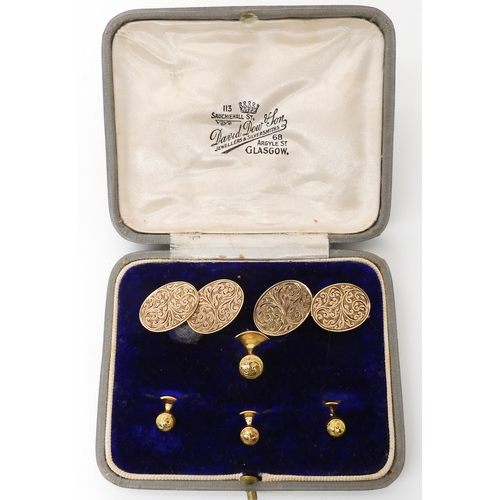 666 - A BOXED SET OF CUFFLINKS AND SHIRT STUDS WITH FLORAL ENGRAVING