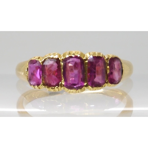 668 - A BRIGHT YELLOW FIVE STONE RUBY RING