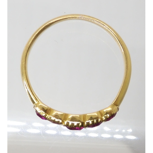 668 - A BRIGHT YELLOW FIVE STONE RUBY RING