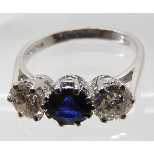 671 - AN 18CT WHITE GOLD FAUX SAPPHIRE AND DIAMOND RING