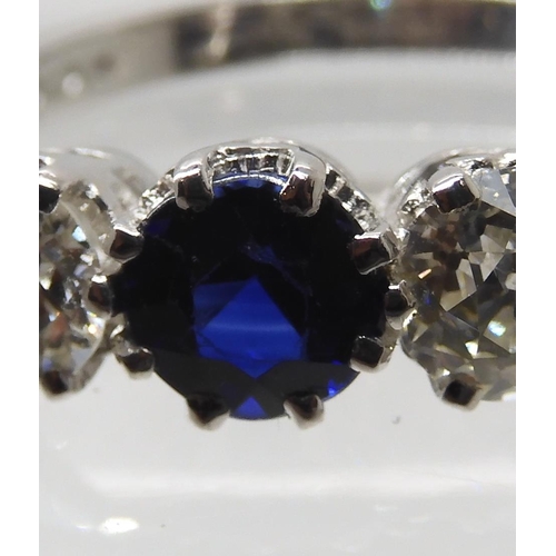 671 - AN 18CT WHITE GOLD FAUX SAPPHIRE AND DIAMOND RING