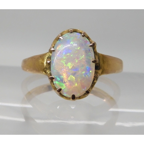 672 - A JELLY OPAL RING