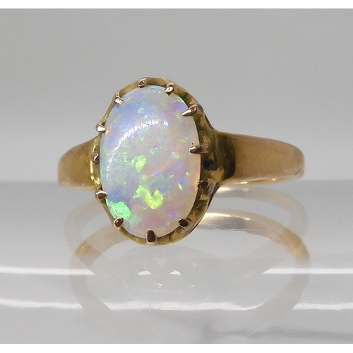 672 - A JELLY OPAL RING