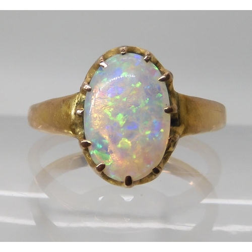 672 - A JELLY OPAL RING