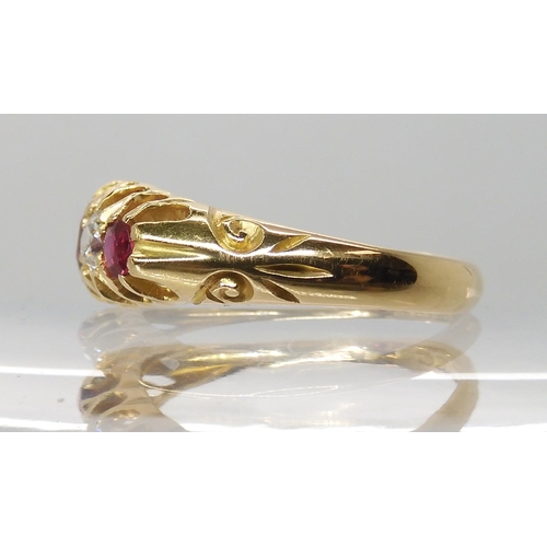 678 - AN 18CT GOLD SYNTHETIC RUBY AND DIAMOND RING