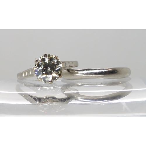 680 - A PLATINUM DIAMOND SOLITAIRE RING WITH MATCHING WEDDING BAND