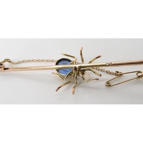 684 - A 9CT GOLD GEM SET SPIDER BROOCH