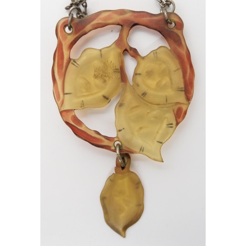 686 - A CARVED HORN ART NOUVEAU PENDANT