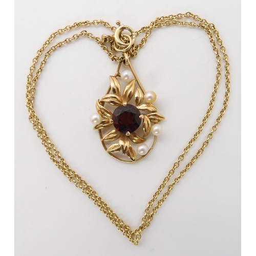 687 - A 9CT GOLD GARNET AND PEARL PENDANT BY CROPP & FARR LTD