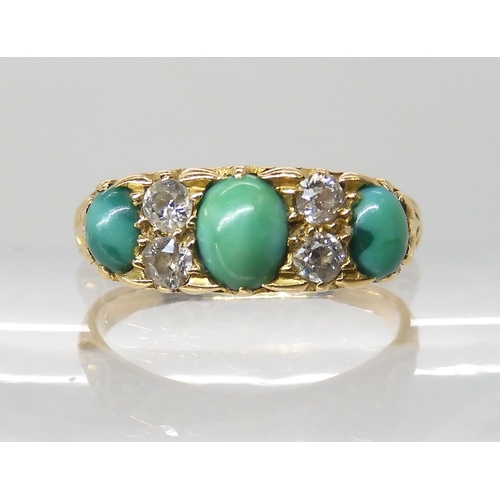 689 - AN 18CT GOLD TURQUOISE AND DIAMOND RING