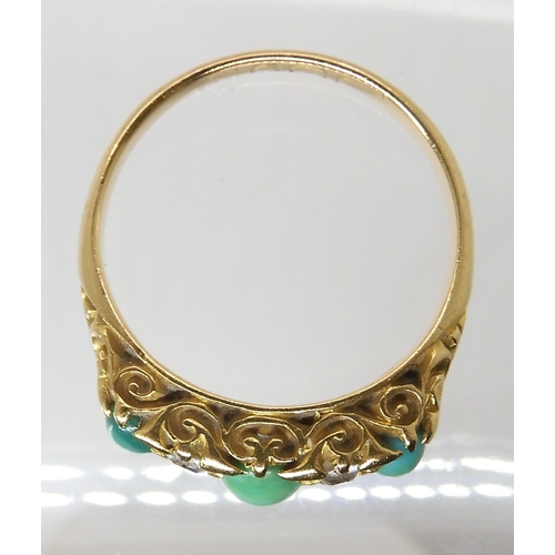 689 - AN 18CT GOLD TURQUOISE AND DIAMOND RING