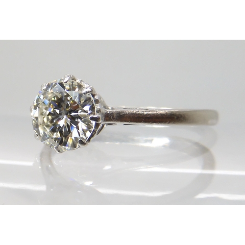 694 - AN 18CT WHITE GOLD AND PLATINUM SOLITAIRE DIAMOND RING