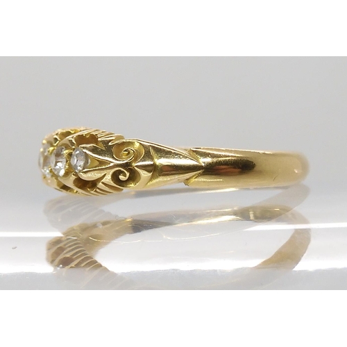 696 - AN 18CT GOLD FIVE STONE DIAMOND RING