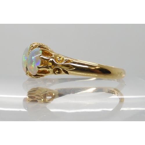 701 - AN 18CT GOLD OPAL AND DIAMOND RING