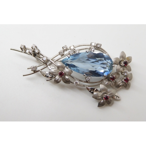 704 - AN 18CT WHITE GOLD AQUAMARINE  DIAMOND AND RUBY BROOCH